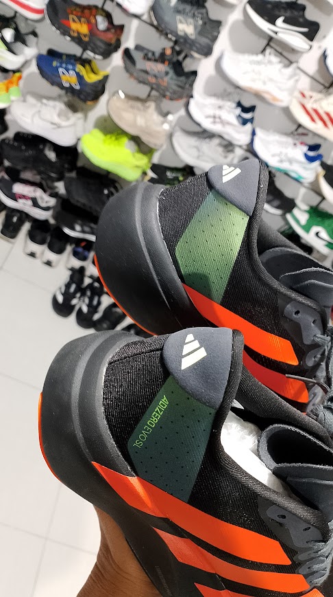 adizro evo sl hitam merah foto 4